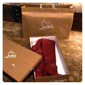 Nearly new beautiful Louboutin red high boots.